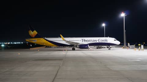 Ex monarch livery mixed with thomas cook livery on an airbus a321 at night - Egypt, Africa. Aviation and travel photography by Christian Boehme.