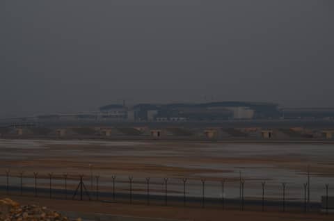 Airport expansion of muscar capital airport with the new terminal during sunset