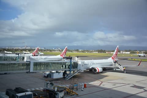Boeing b737 800 virgin australia at the airport gate in adelaide south australia